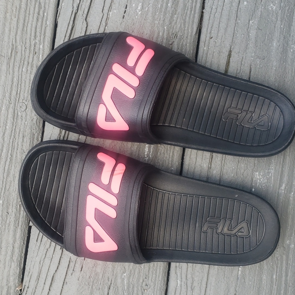 Black and pink FILA slides